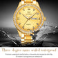 Gold-tone quartz watch with sparkling bezel and textured yellow dial on wrist