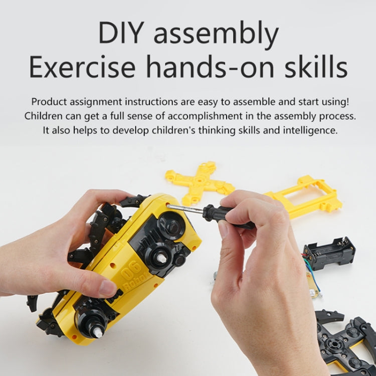 Hands assembling a yellow and black robot dog DIY kit with small connector parts