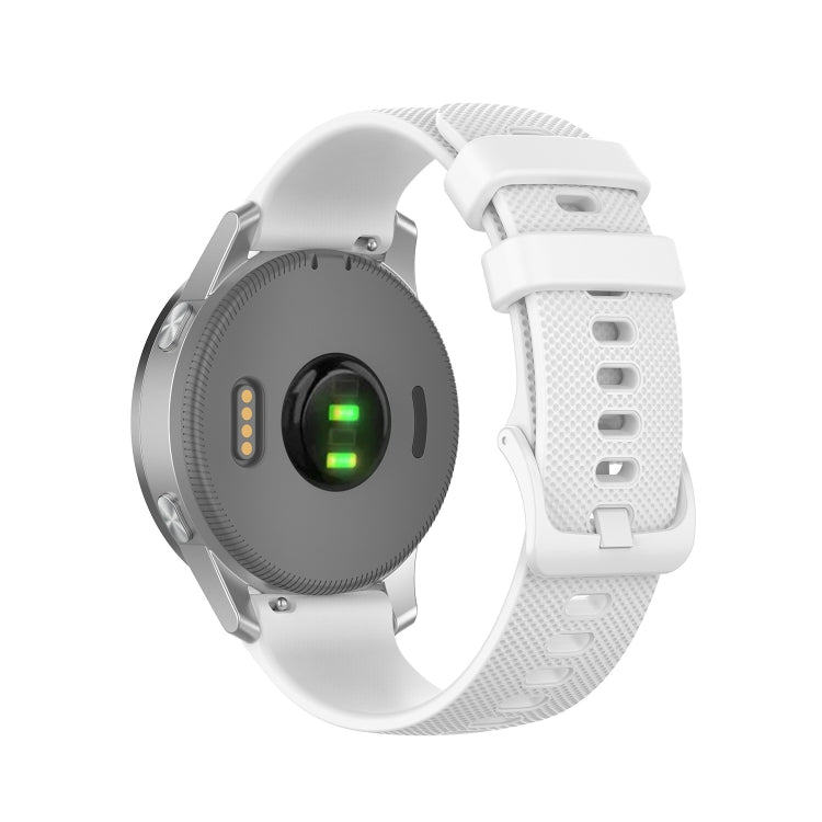 White silicone wristband with textured holes and metal clasp, shown with watch face