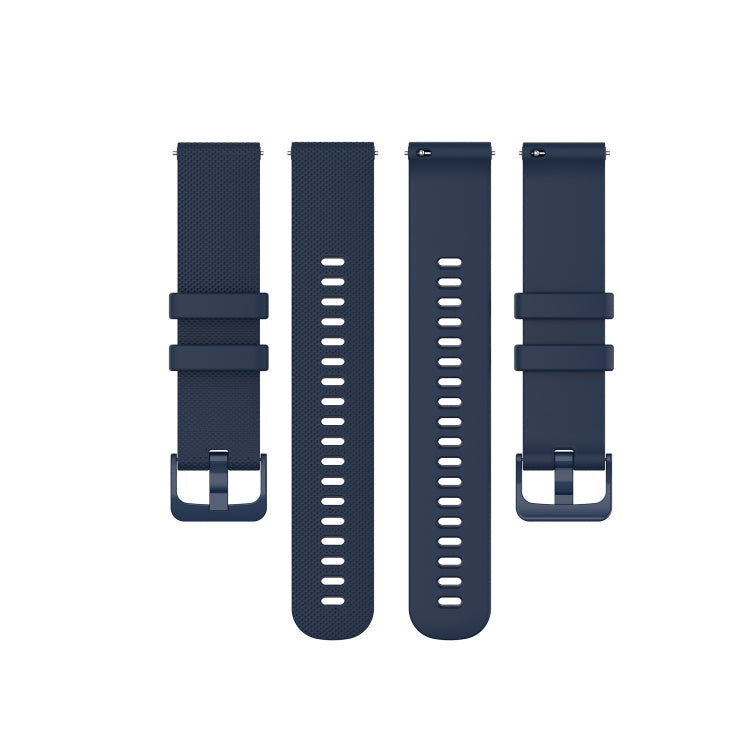 Navy blue silicone wristband set with textured perforations and metal buckle