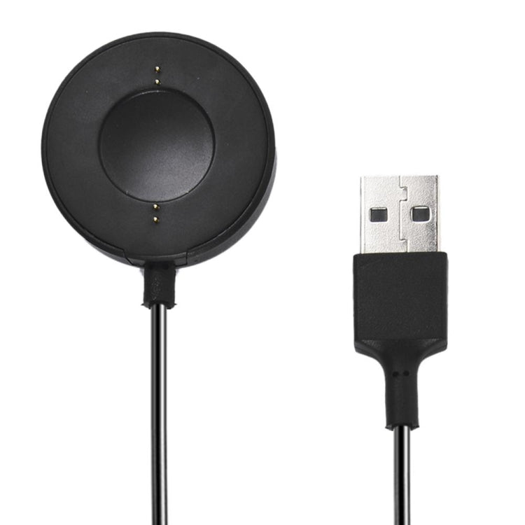 Black charging cable with magnetic round base and USB-A connector, close-up