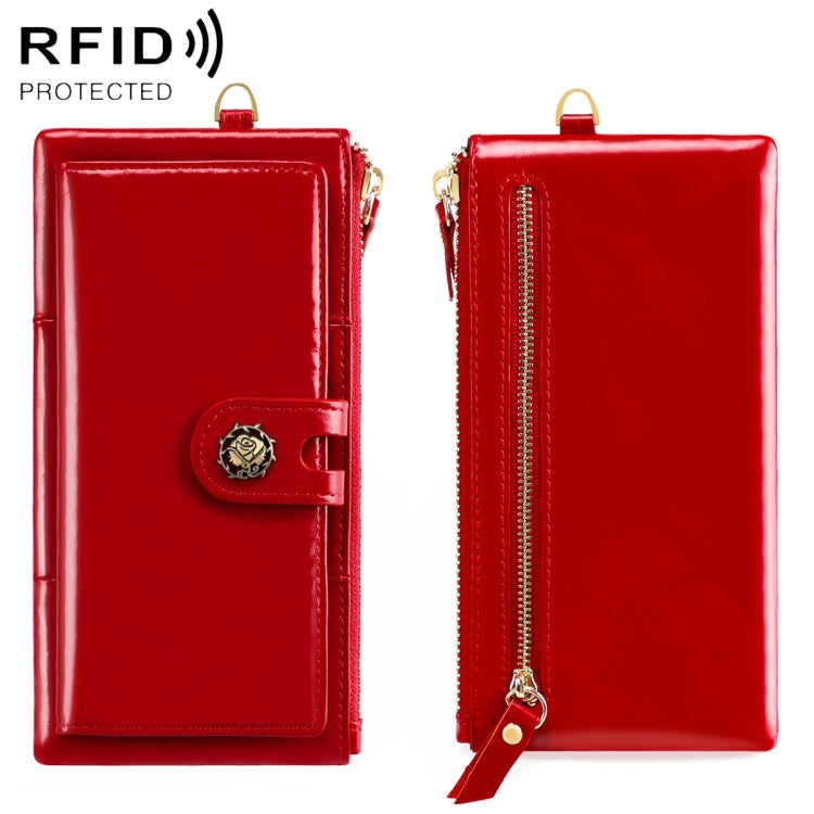 Red oil-wax vintage texture wallet with snap button strap and gold zipper.