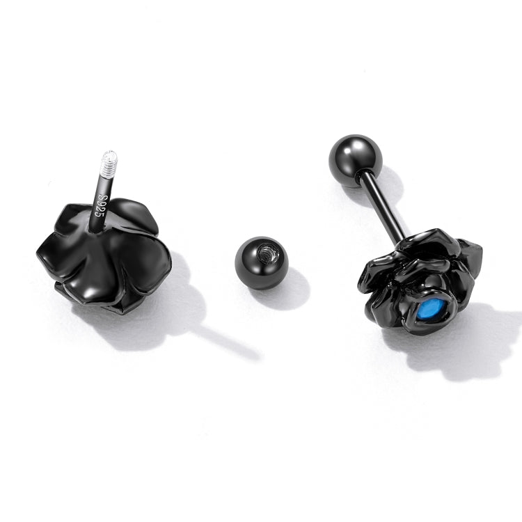 Black rose stud earrings with blue center stone and visible backing posts
