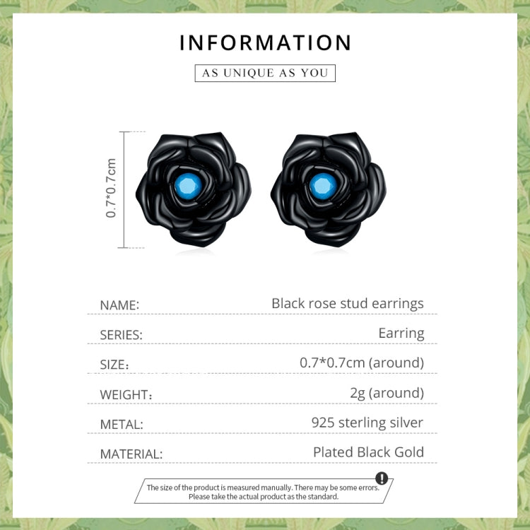Black rose stud earrings with blue gemstone center shown on an information card