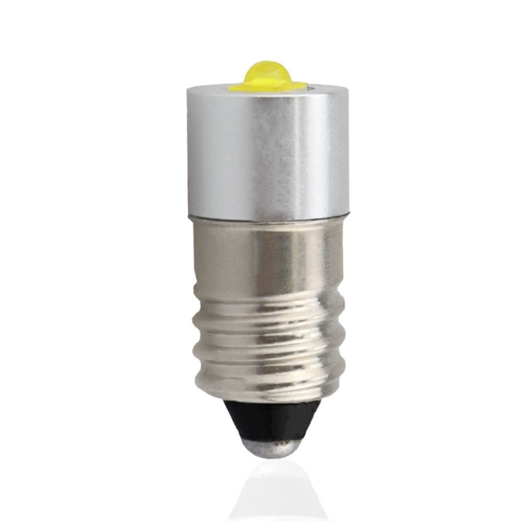 E10 LED flashlight bulb with metal screw base and small yellow lens