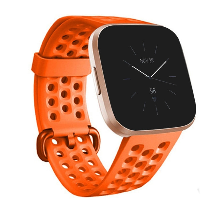 Large breathable silicone watch band with perforated strap and adjustable buckle, orange.