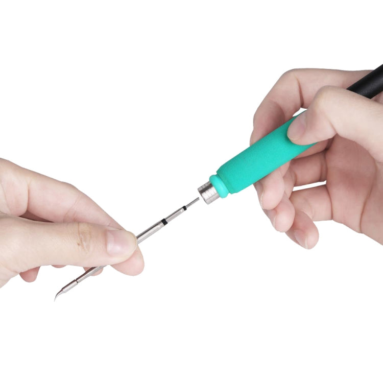 Soldering iron with teal handle, metal tip held by hands