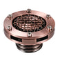 Bronze round motorcycle fuel tank cap with copper-colored mesh grille and mounting bolts