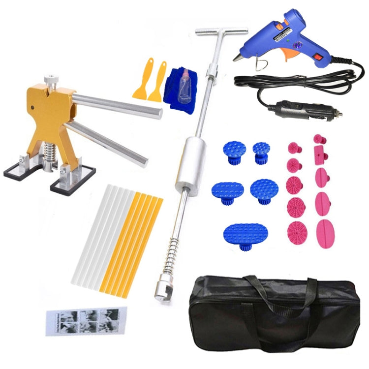 Paintless dent puller kit with 12V glue gun, pull rods, blue tabs, and storage bag.