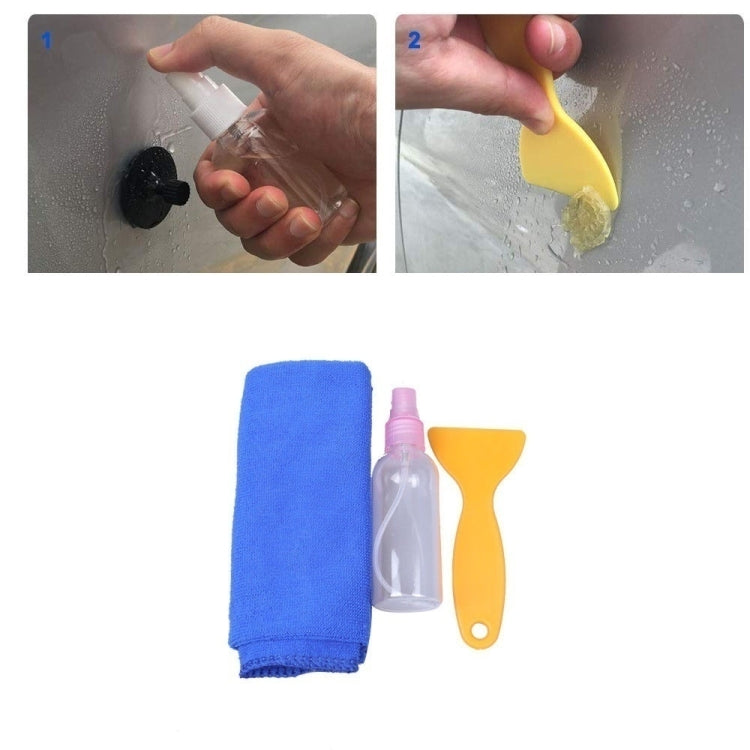 Cleaning accessory set: blue cloth, spray bottle, and yellow scraper tool