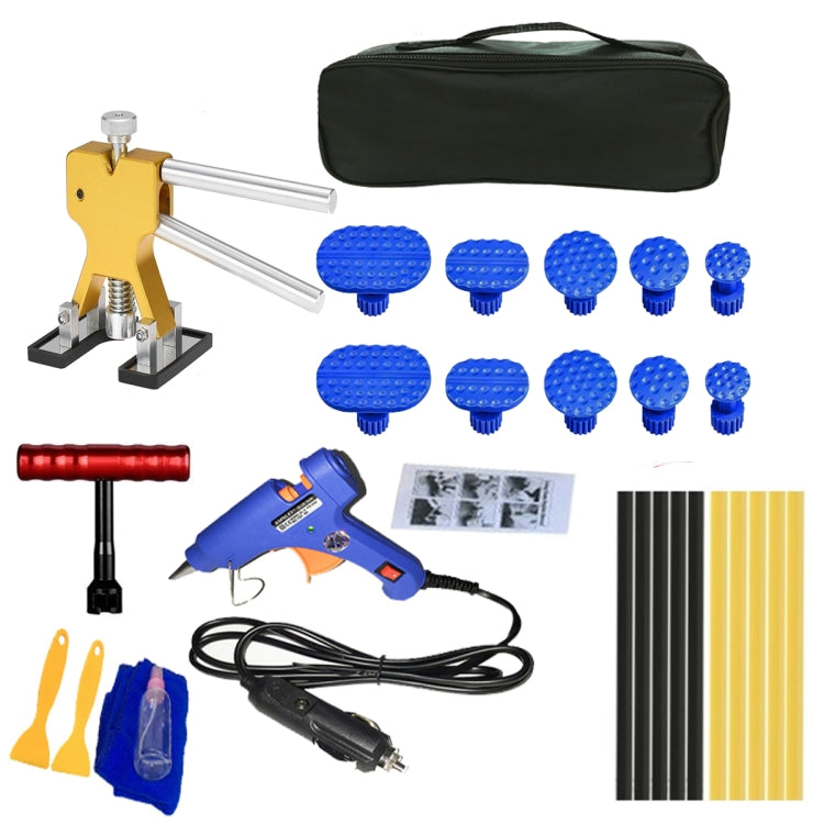 Car dent repair kit with yellow puller, blue tabs, glue gun, cords, and storage bag