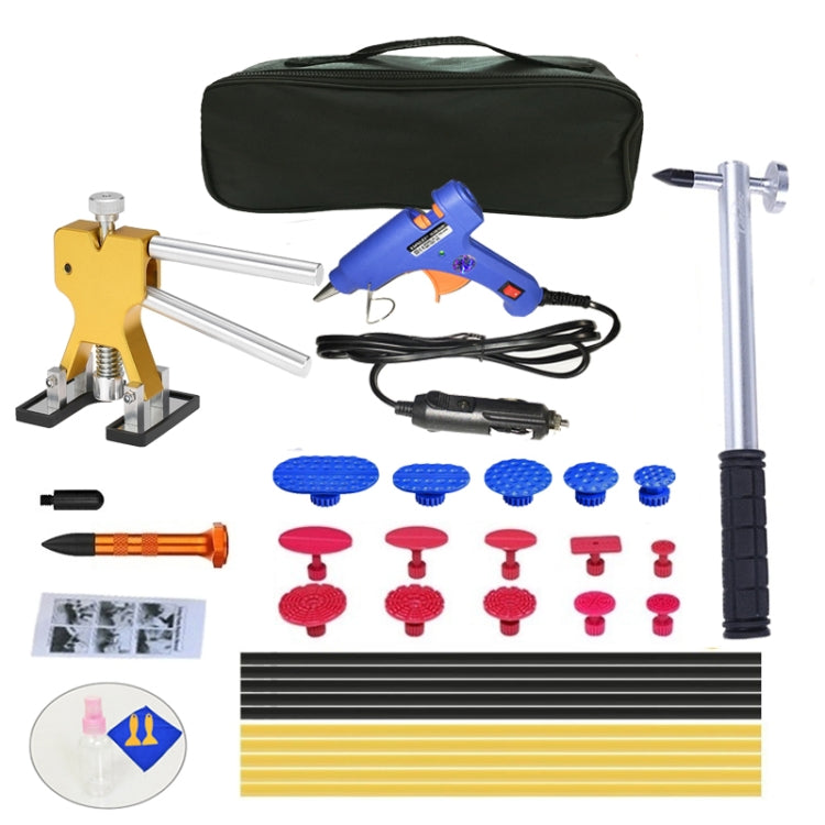 Car dent puller kit with blue glue gun, suction tabs, pull rods, and carrying case