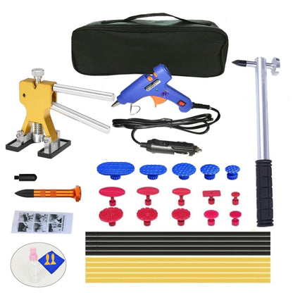 Car dent puller kit with blue glue gun, suction tabs, pull rods, and carrying case