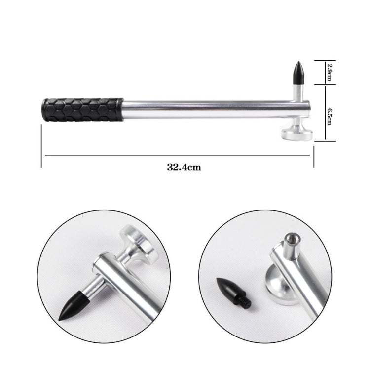 Metal dent puller with silver shaft, black grip handle, and pointed tip attachment