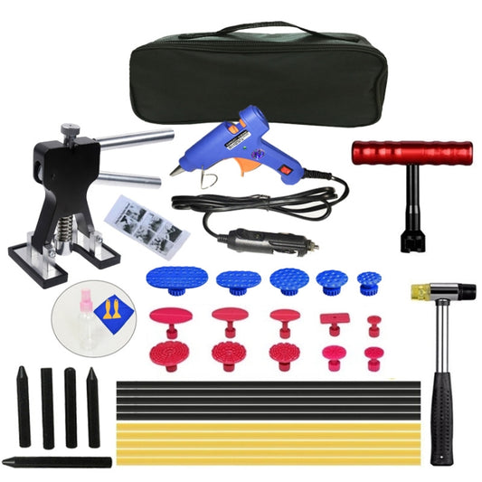 Car paintless dent puller kit with glue gun, suction tabs, rods, tools, and storage bag