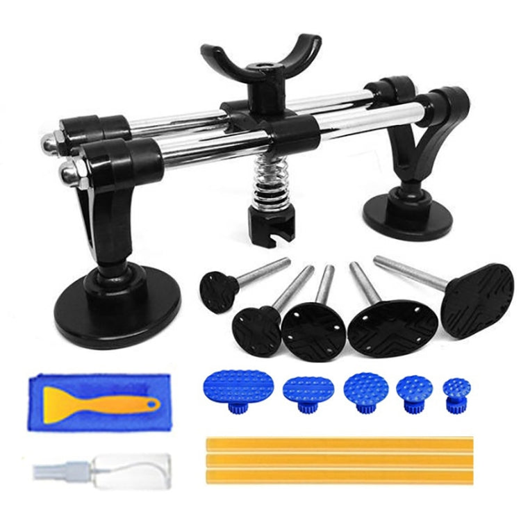 Car dent puller tool kit with bridge lifter, suction cups, and pulling rods
