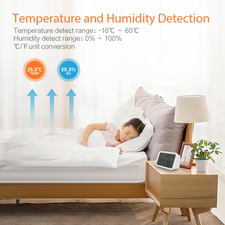 Temperature and humidity sensor on a bedside table with LCD showing current temp and humidity.