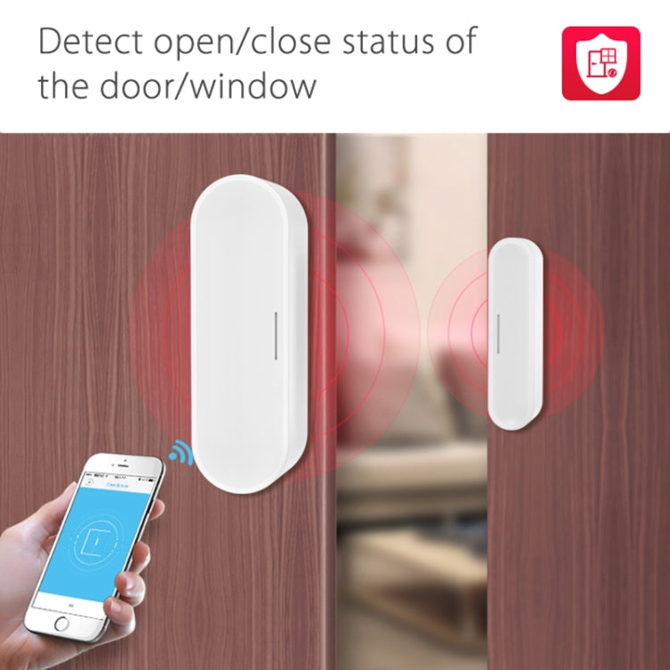 White door/window sensor mounted on wood door with contact piece