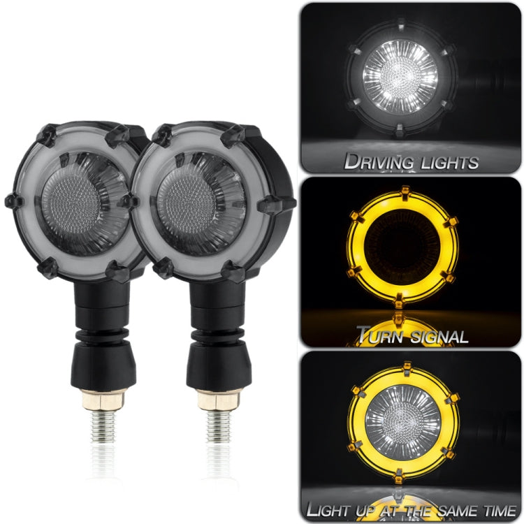 Pair of round LED motorcycle turn signals with clear lens and black mounting stems