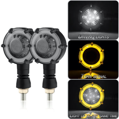 Pair of round LED motorcycle turn signals with clear lens and black mounting stems