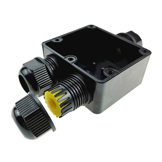 IP68 waterproof junction box with cable glands, dark housing, and yellow seal inserts