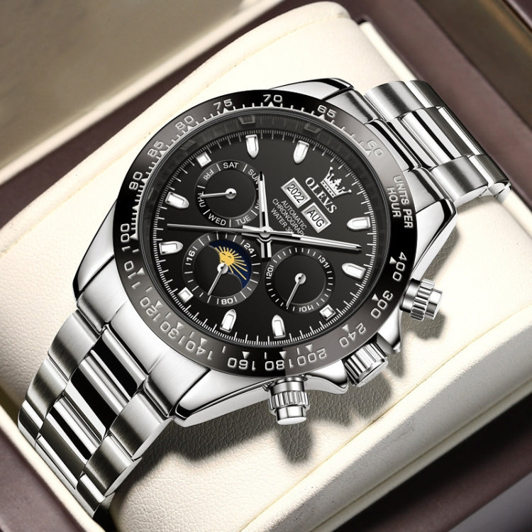 Men's multifunction mechanical watch with black dial, silver bracelet, and multiple subdials
