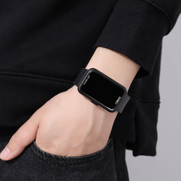 Black PU strap LED electronic watch on wrist with dark square face and side buttons