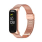 Rose gold stainless steel mesh watch band with buckle clasp for fitness tracker.