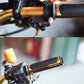 Motorcycle grip cover set on handlebar; black textured grips with gold end insert