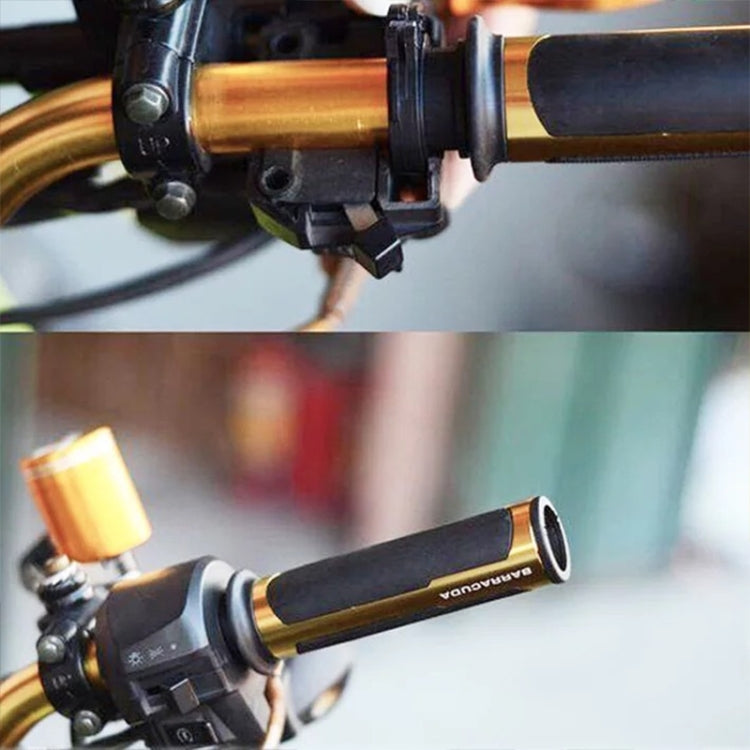 Motorcycle grip cover set on handlebar; black textured grips with gold end insert