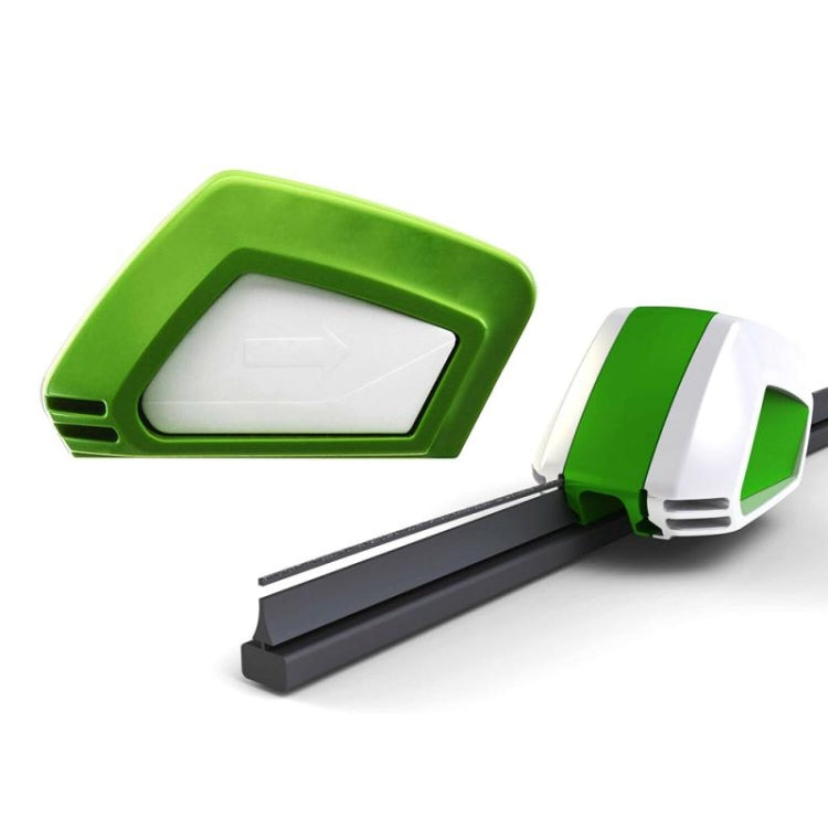 Green-and-white wiper blade restorer with attached guide and black handle