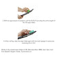 Hand applying pressure with green wiper blade restorer along wiper blade