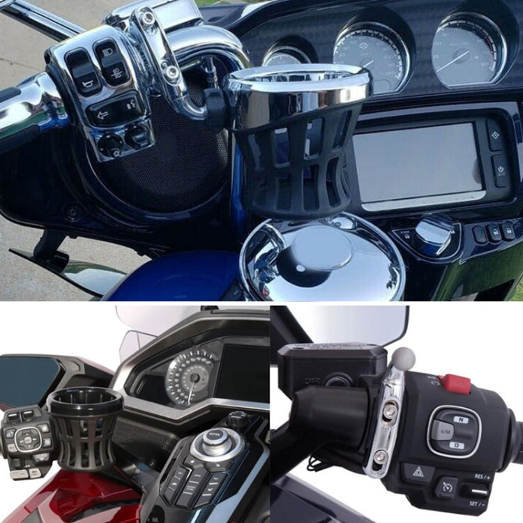 Motorcycle drink cup holder mounted near handlebar controls.