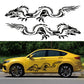 Yellow car side with black dragon totem decal across the doors.