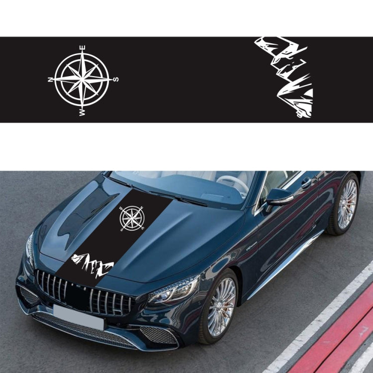 Compass pattern decorative sticker: black rectangle with white compass rose on car hood.