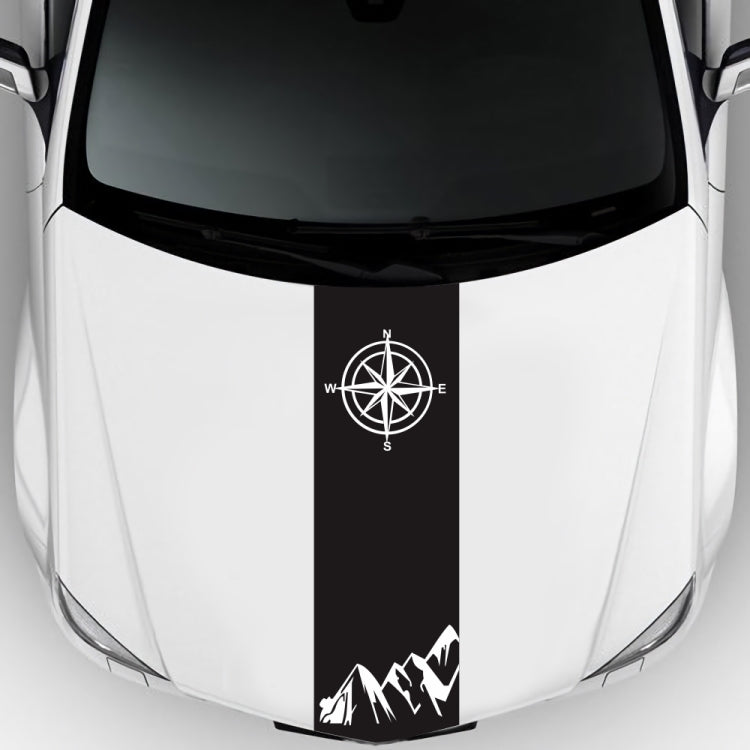 Compass sticker panel on white car hood: black vertical strip with white compass rose graphic.