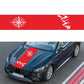 Red compass pattern decorative sticker with white compass rose and jagged graphic on car hood.