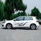 Black animal-flame vinyl decal on white car door, curved side placement