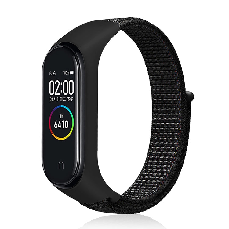 Nylon weave watch band with black strap for fitness tracker, black display case.
