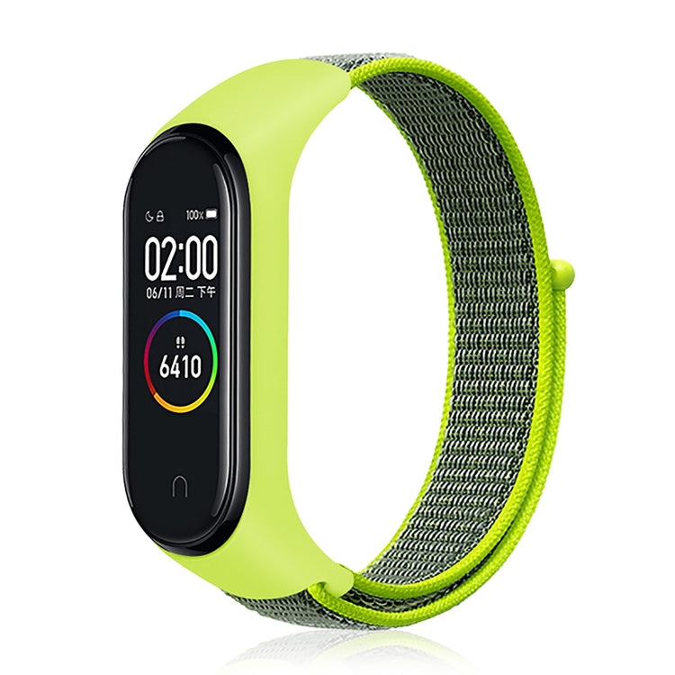Nylon weave watch band with lime green strap for fitness tracker, light green display case.