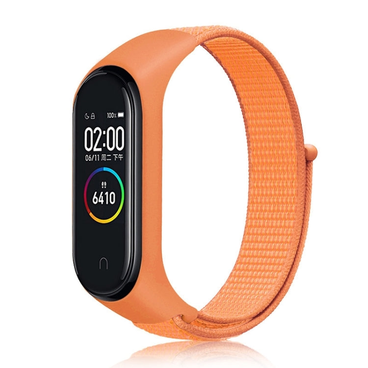 Nylon weave watch band with orange strap for fitness tracker, orange display case.