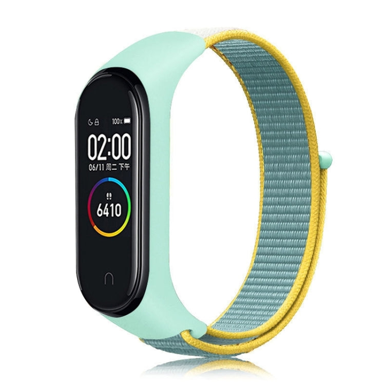 Nylon weave watch band for Xiaomi Mi Band 7 in light teal with yellow edge