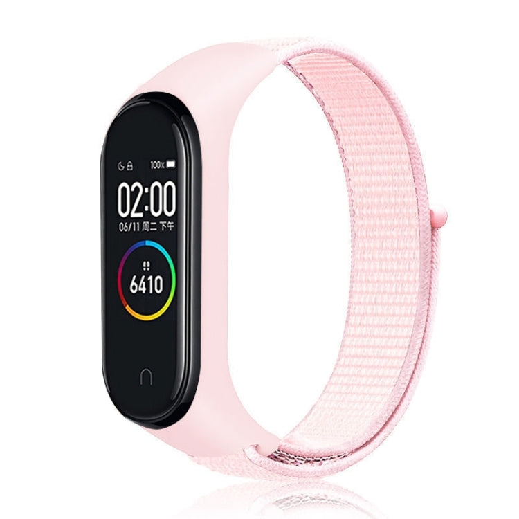 Nylon weave watch band for Xiaomi Mi Band 7 in pale pink with pink woven strap