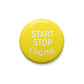 Close-up yellow START STOP ENGINE engine start/stop button