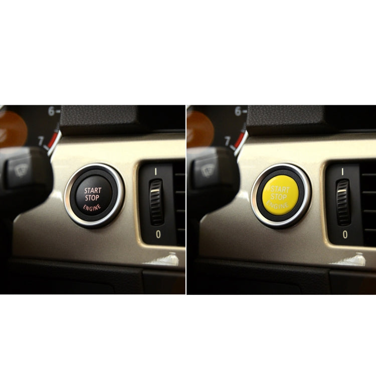 Installed engine start/stop button with yellow ring on car dashboard