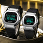 Two silver digital dual-display sport watches with glowing green screens