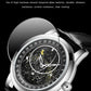 Close-up of black luminous dial mechanical watch with black leather strap and steel case.