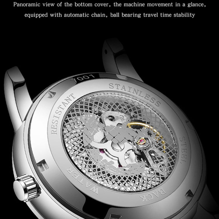 Mechanical watch case back with see-through movement window on a leather strap.