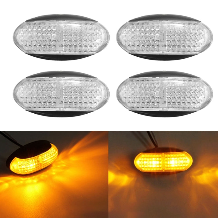 Set of 4 oval LED side clearance marker lights with clear lens and black housing.
