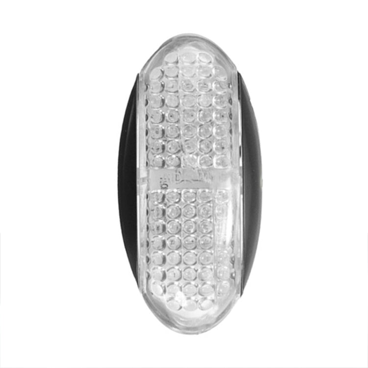 Oval clear-lens LED side marker light with black rim and textured LED array lens.